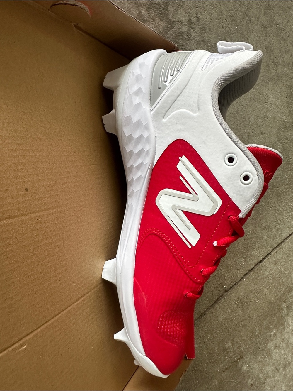 New Balance Womens or Girls Red and White Molded Softball Cleats - size 11